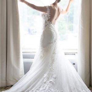 Elegant Designer’s ivory wedding dress
